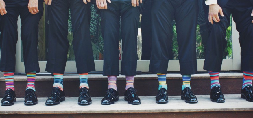 Wearing colorful dress socks adds a touch of flair